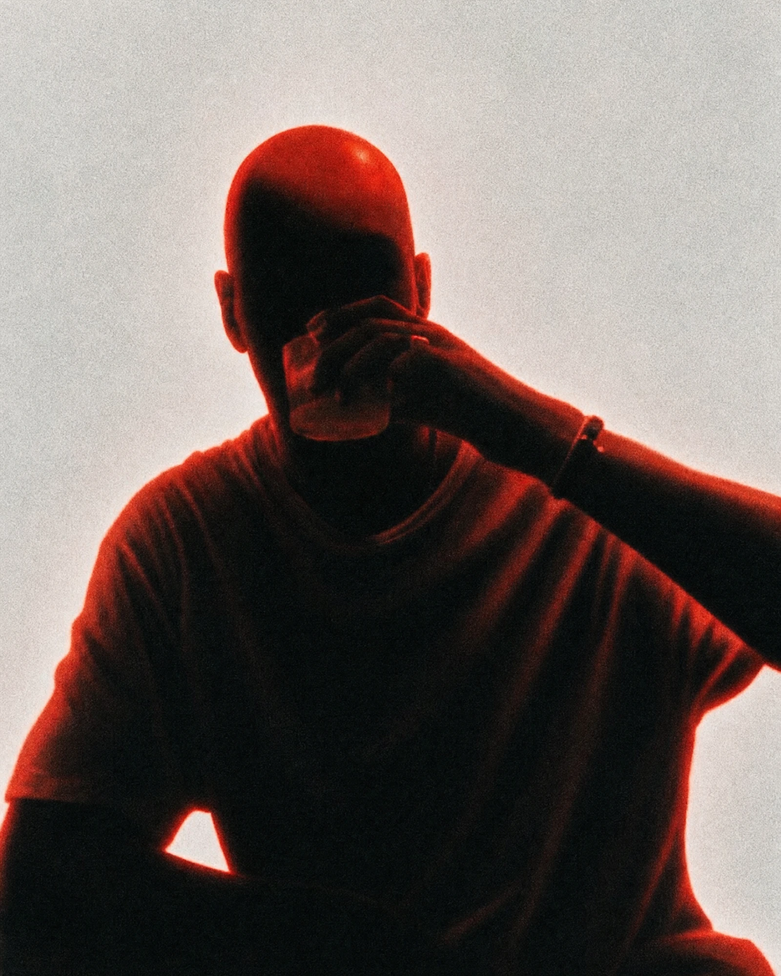 Red-lit portrait of Chen Mizrach